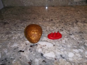 The Norpro potato feet holder has 3 prongs to hold the potato in place in the microwave.