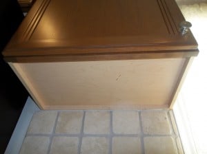 I placed the hooks on the underside of the cabinet.