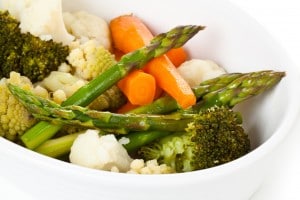 Mixed steamed veggies on a plate.