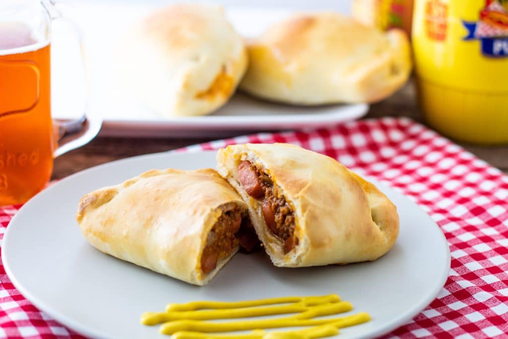 Coney Dog Pizza Pockets with mustard and beer