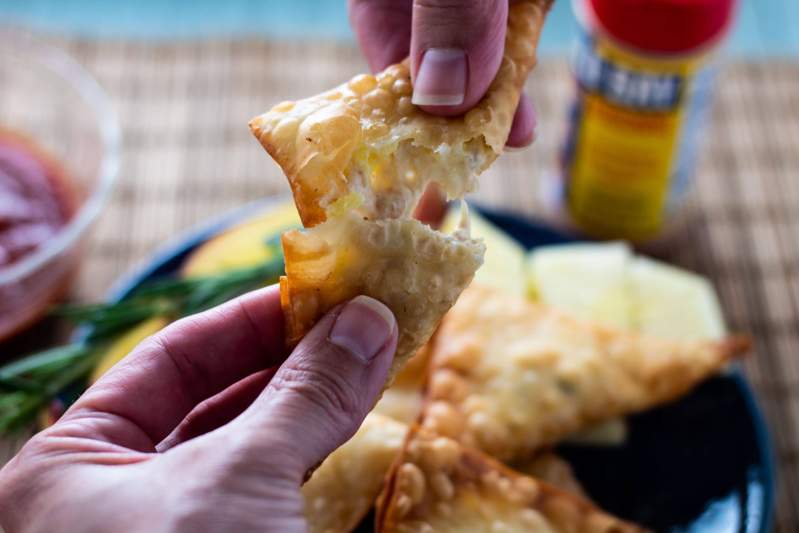 Mango Pineapple and Crab Wontons being opened