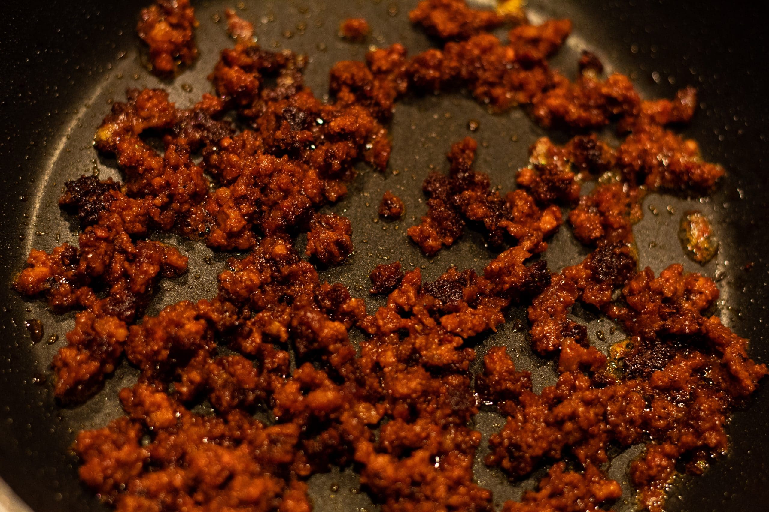 This is an image of cooked chorizo in a pan.