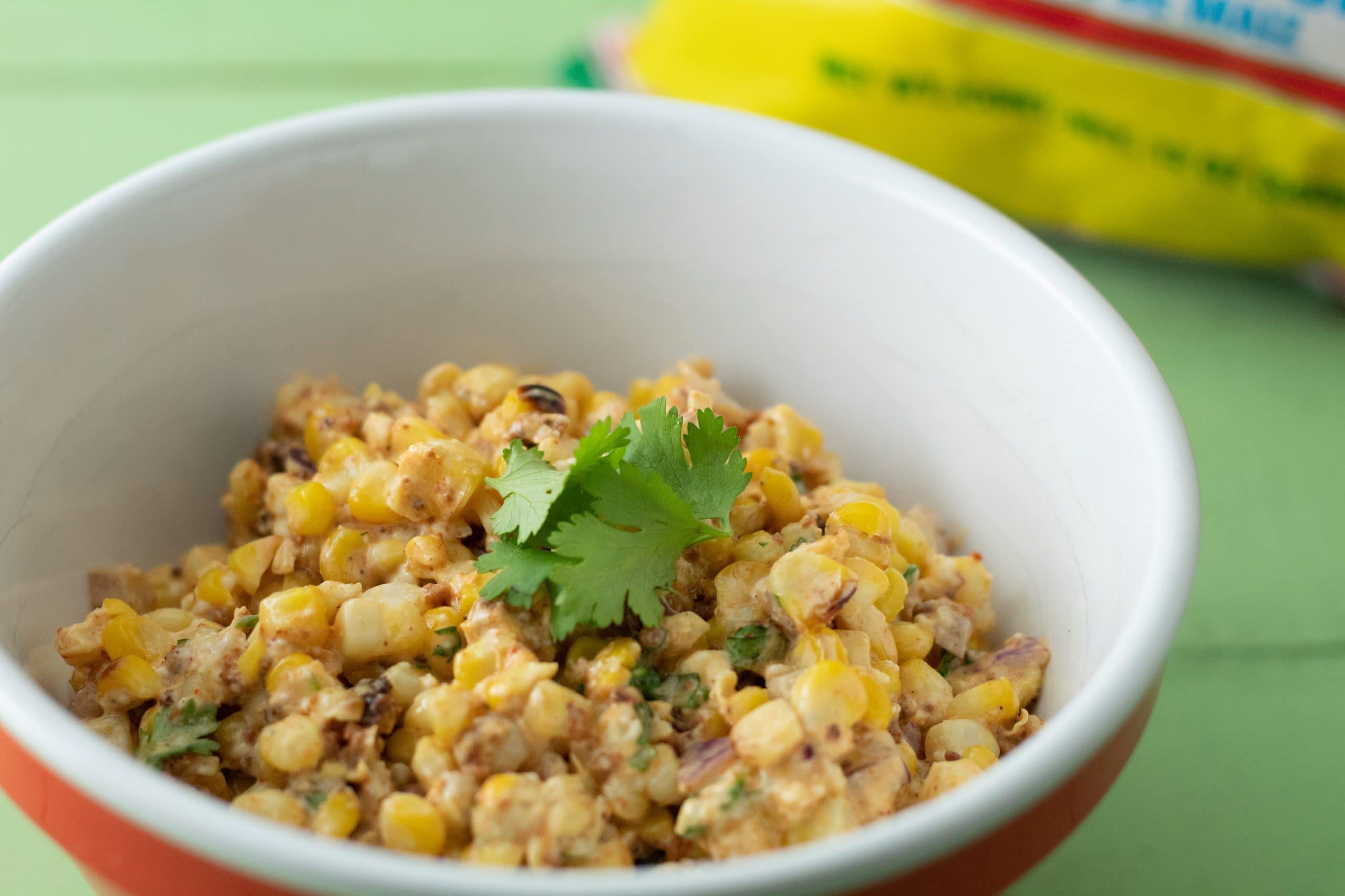 This is an image of chorizo and corn dip in a bowl.