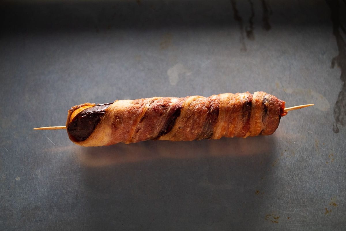 This is an image of our deep-fried bacon-wrapped hotdog fresh out of the fryer.