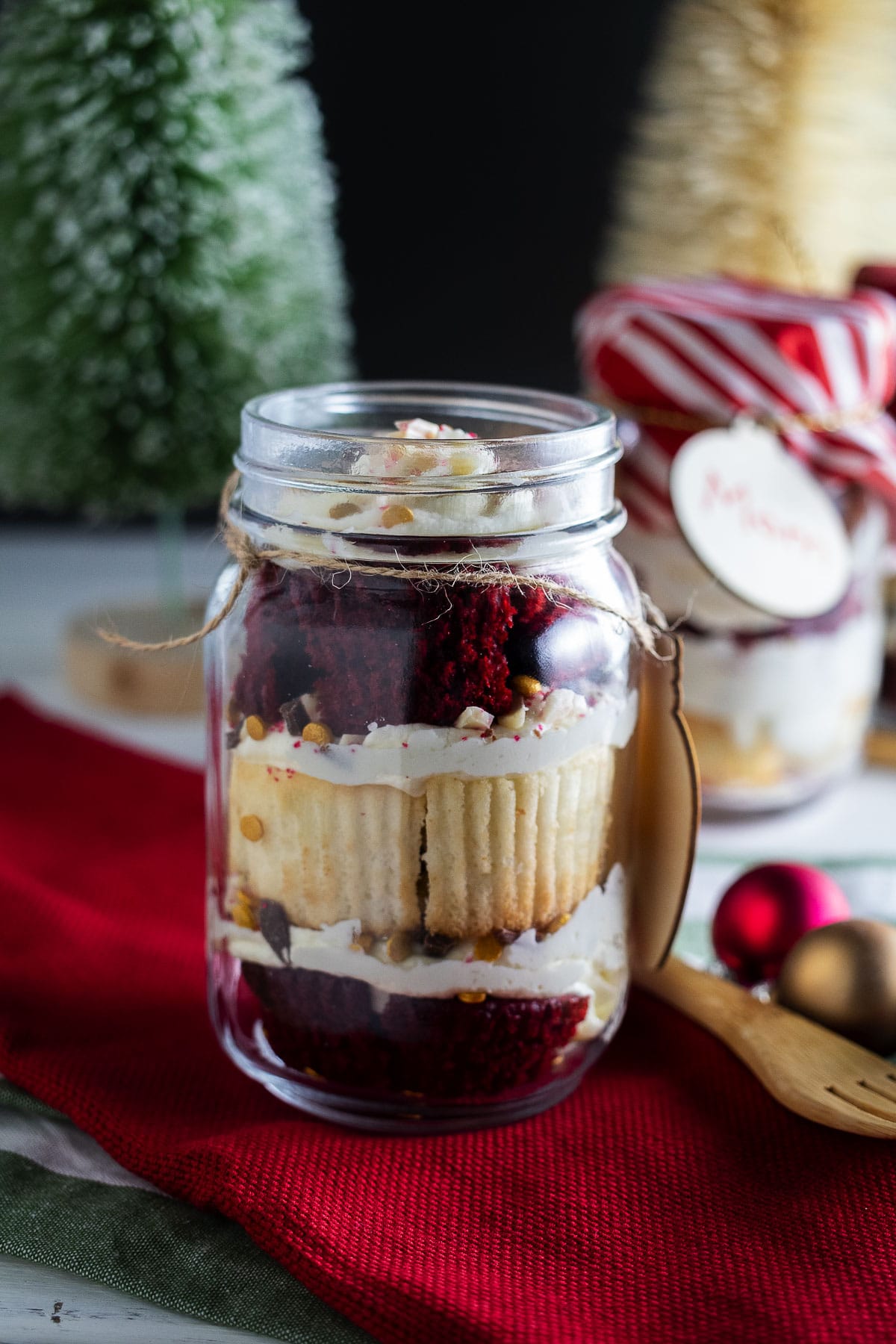 This is an image of the Christmas cake jars with gift versions in the background.