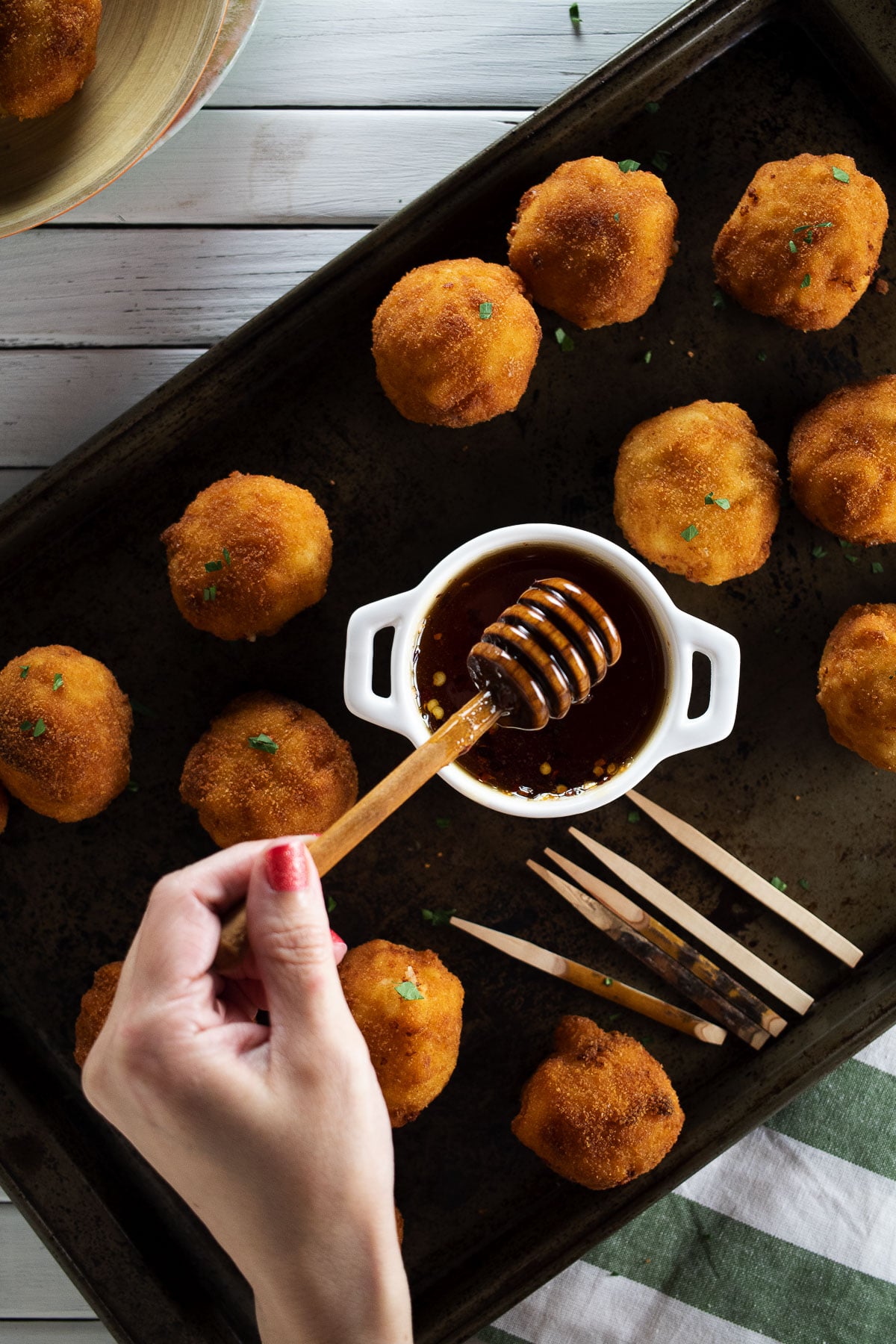 Overhead image of hot honey mac and cheese balls.