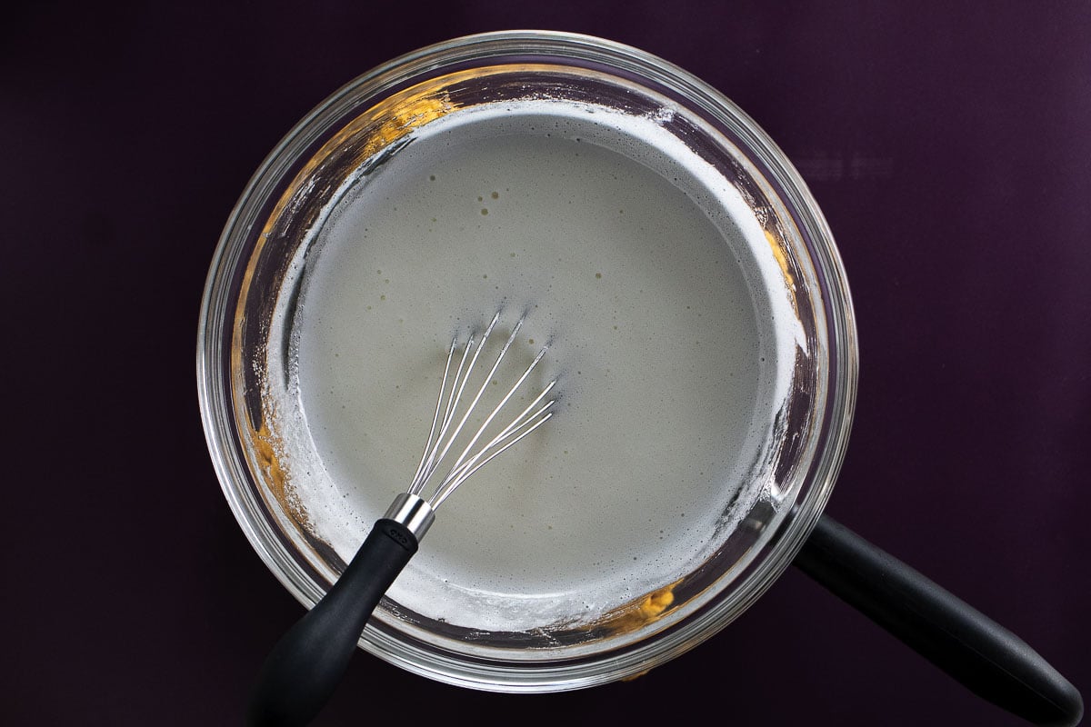 This is an image of frothy marshmallow mix in a double boiler.