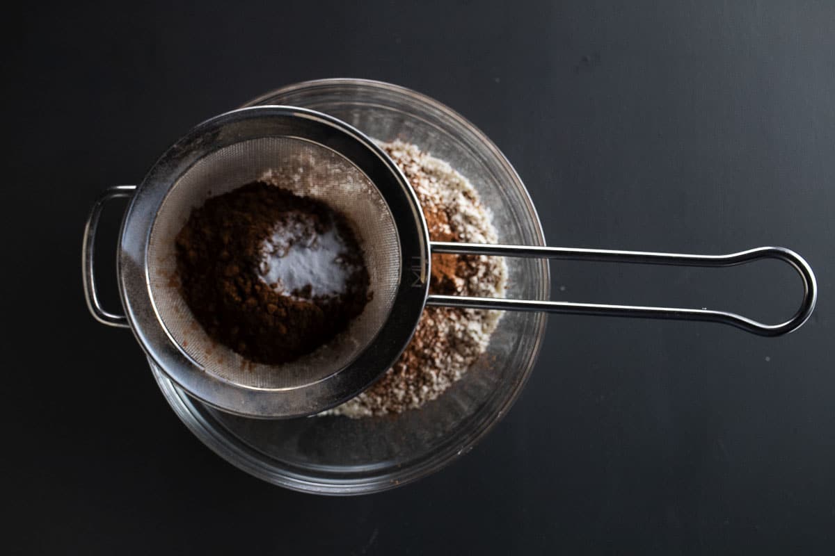 This is an image of the cocoa and baking soda sifted into the flour.