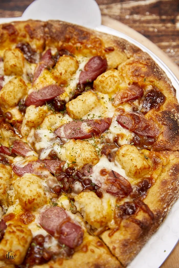 Campfire Cheesy Hot Dog & Baked Beans Pizza with Crispy Tots from the kitchen whisperer.