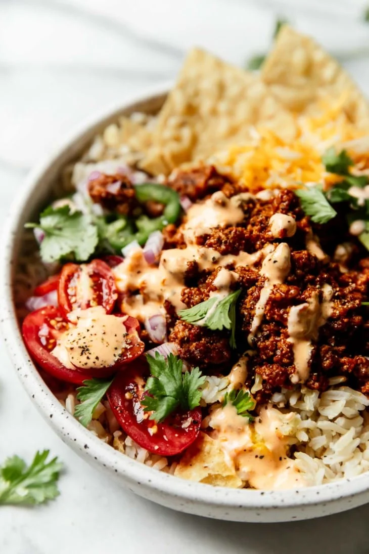 Easy beef taco bowl with salsa ranch from The Real Food Dieticians.