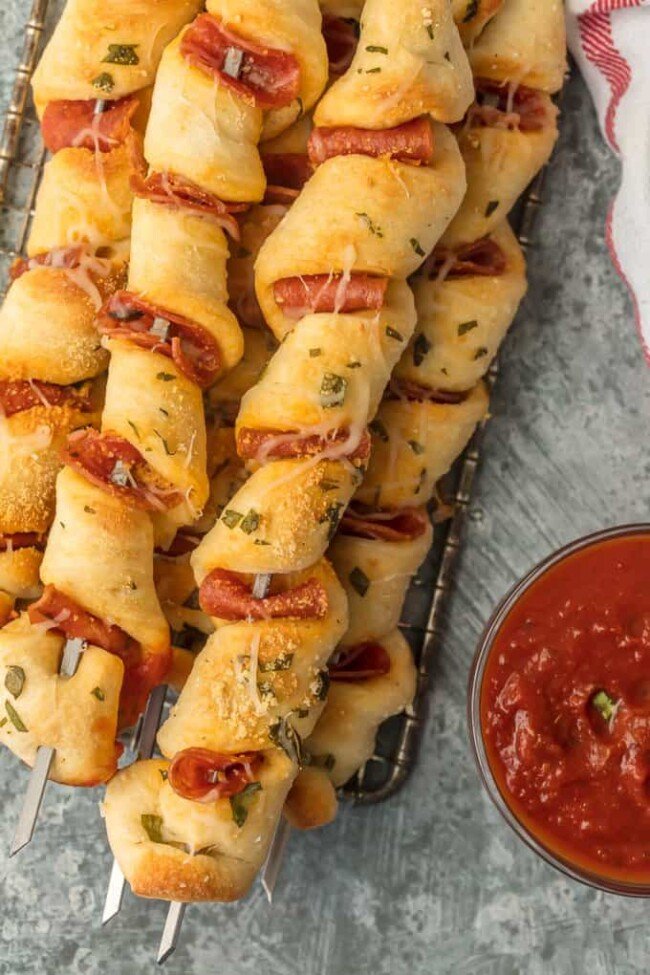 Pizza Sticks with Pepperoni (Pizza on a Stick) from The Cookie Rookie.