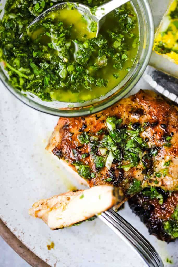 5 star grilled chicken thighs chimichurri from Our Happy Mess.
