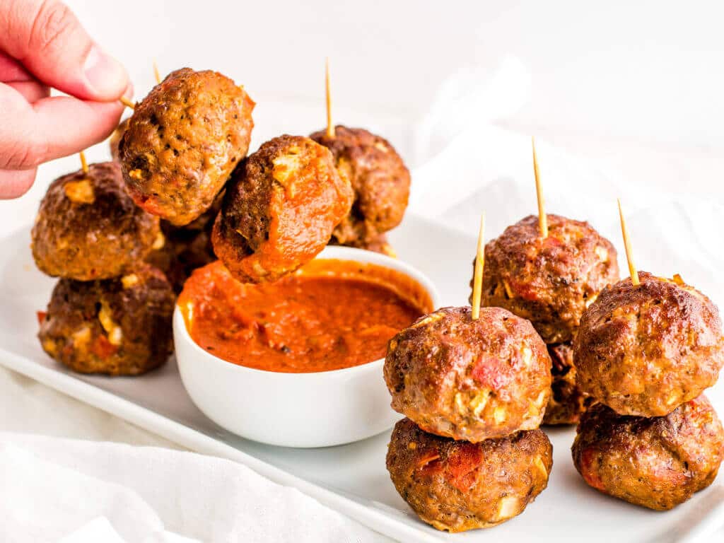 This is an image of easy keto pizza meatballs from The Healthy Little Peach.