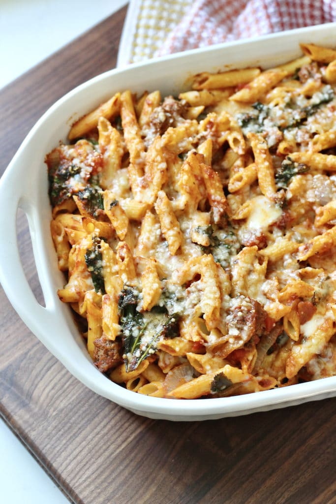 This is an image of cheesy beef & kale pasta bake from Milk and Honey Nutrition.