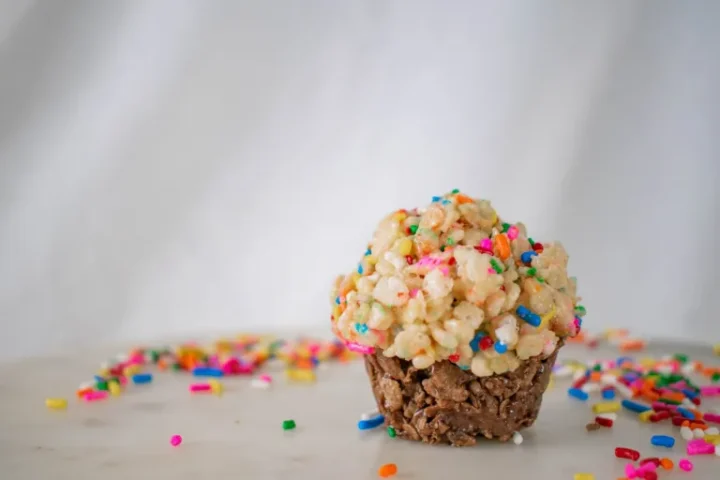 Mini birthday cake rice krispies treats from hand held eats.