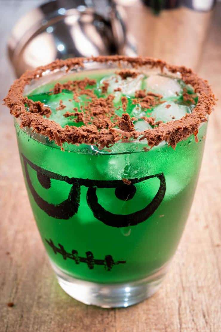 Green "Frankenstein" drink with chocolate shavings rimmed glass.