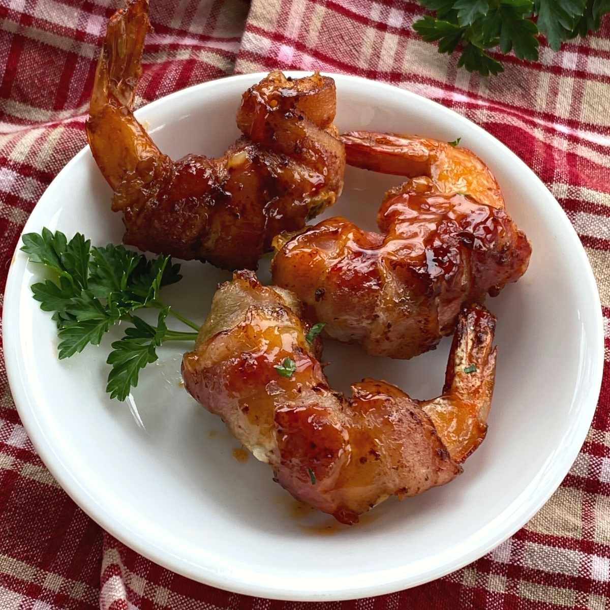 Bacon-wrapped cream cheese stuffed shrimp.