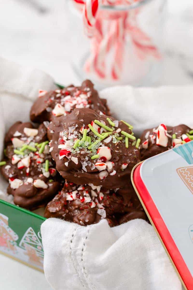 Festive Christmas candy in a decorative tin container.