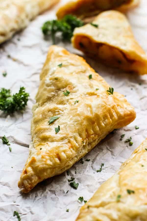 Malaysian curry puff on parchment paper.