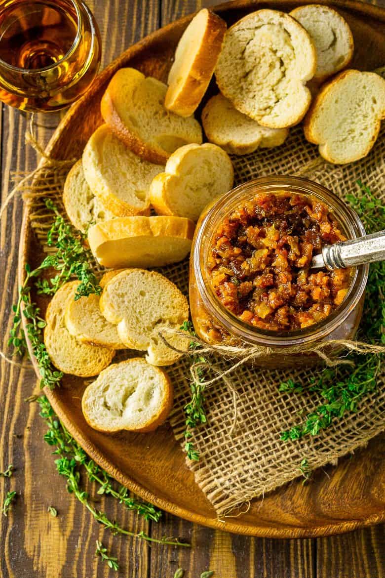 Bourbon bacon jam on a platter with bread.
