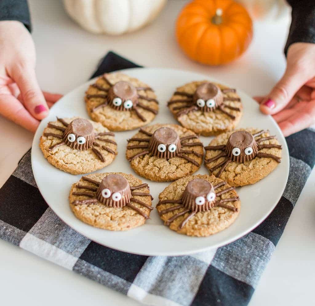 Cookies with Reese's peanut butter cups spiders on cookies.