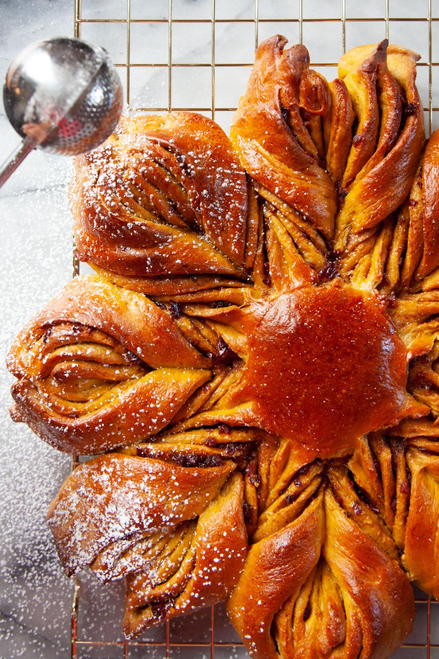 Pumpkin star bread on cooling rack.