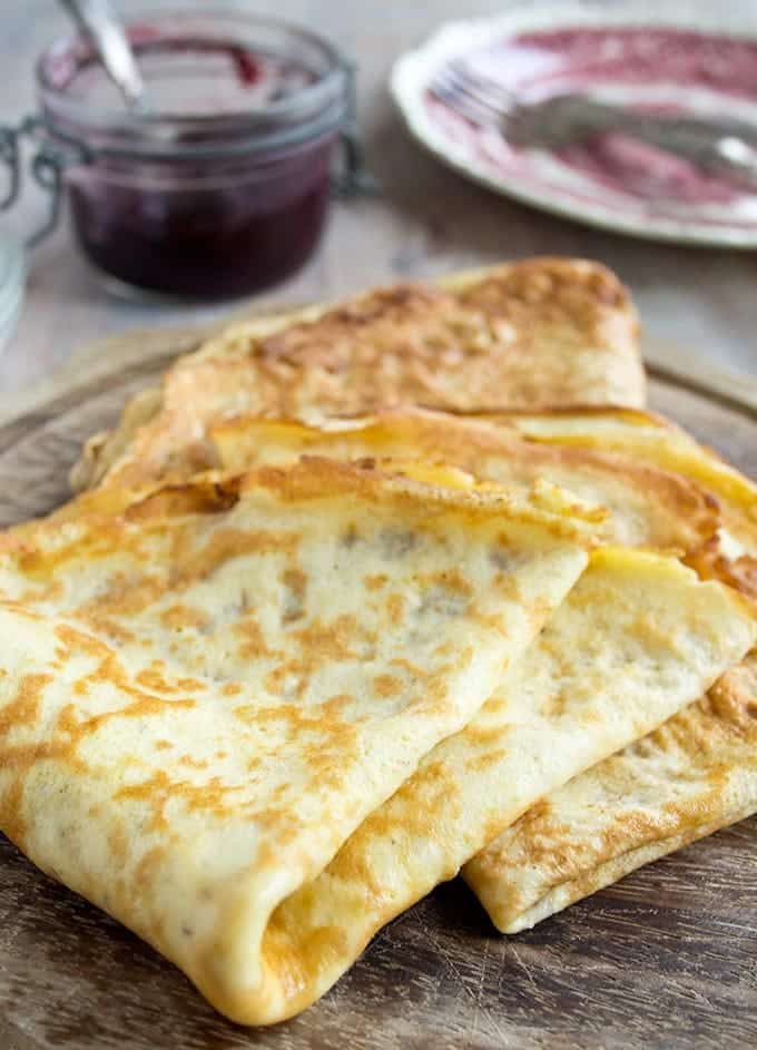 Low carb crepes on a wooden board.