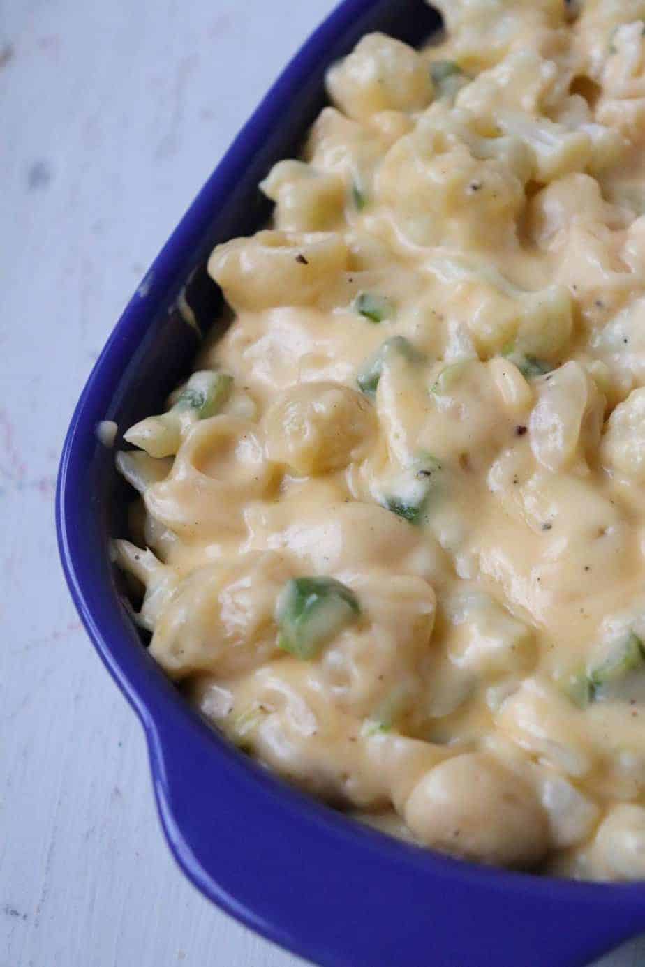 Cauliflower mac and cheese in a blue casserole dish.