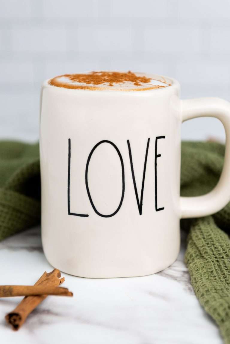 Coffee maple latte in a white mug that reads "love."