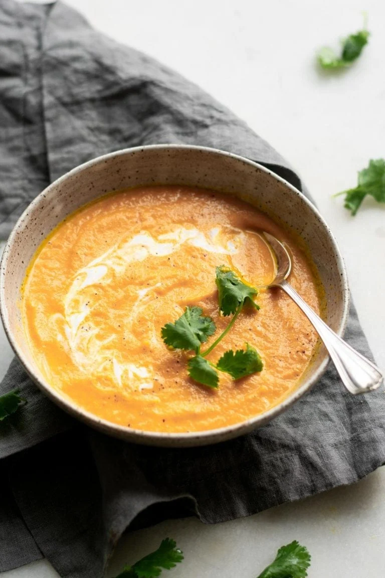 Coconut ginger carrot soup in a bowl