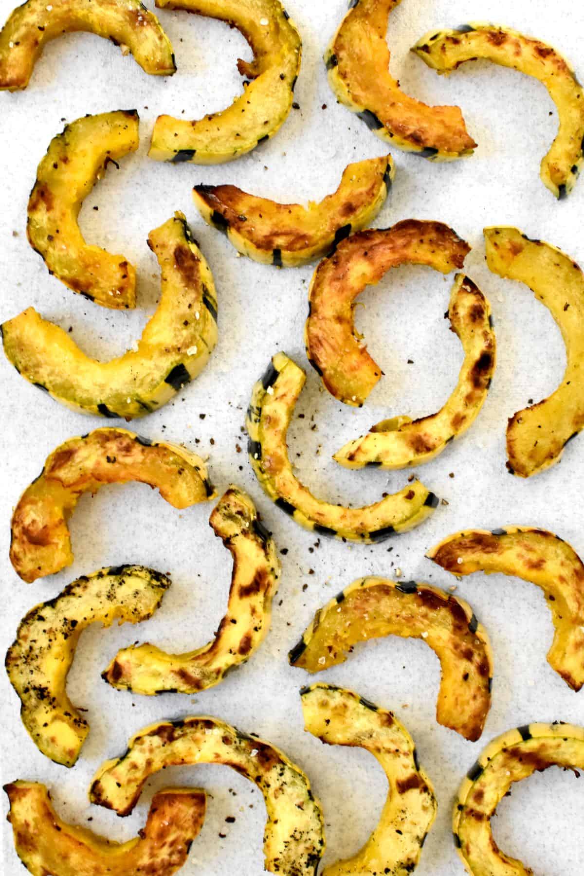 Grilled delicata squash slices.