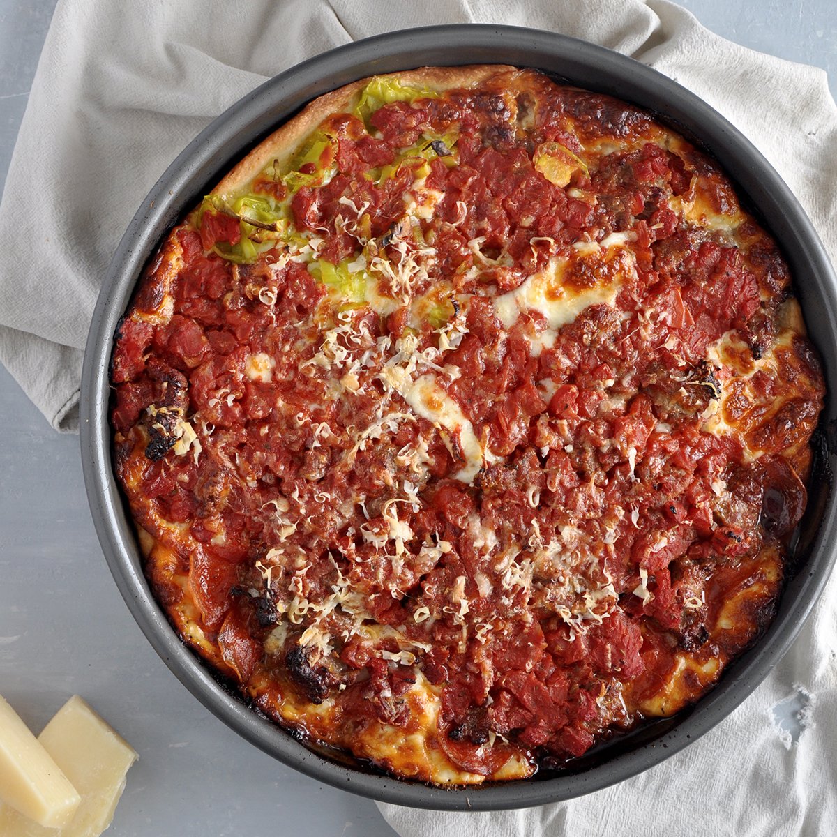 Chicago deep dish meat lover pizza in a pan.