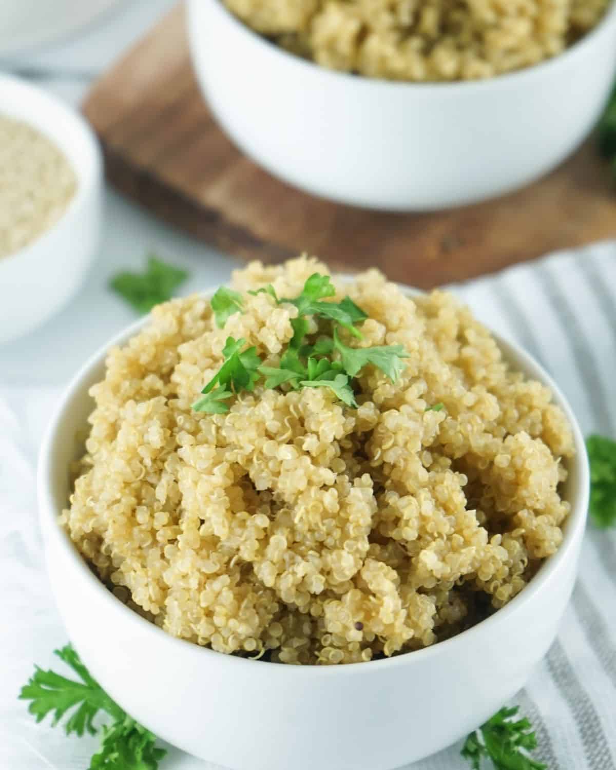 White bowl full of quinoa.