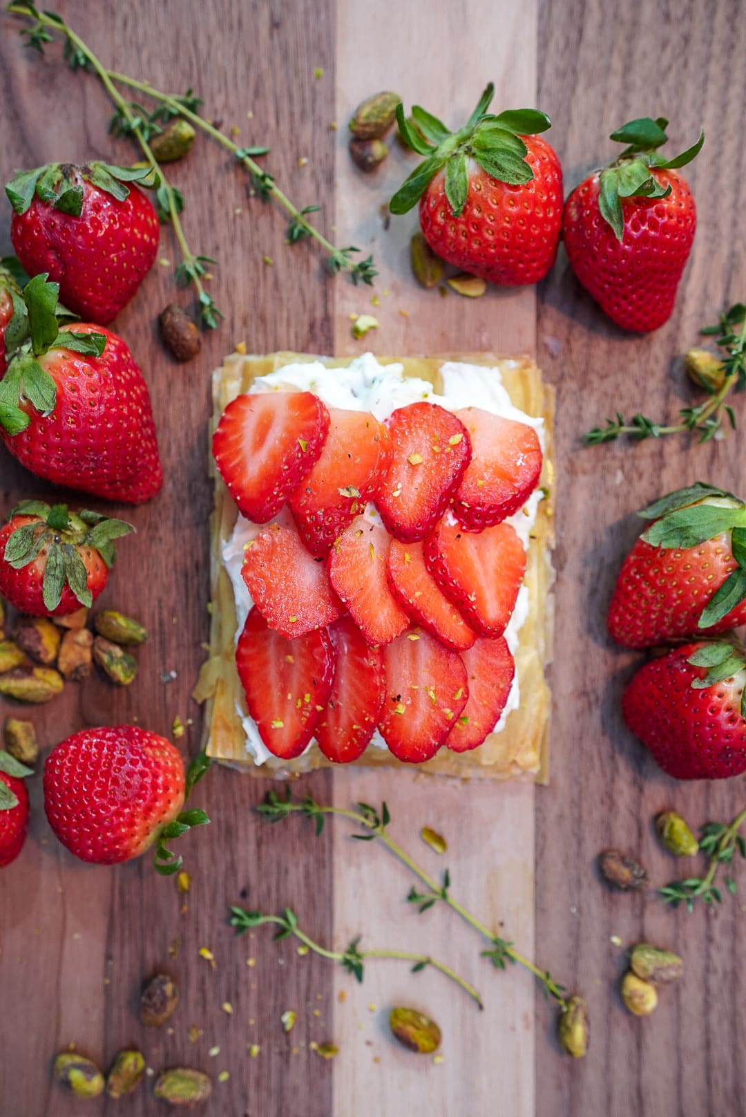 Phyllo dough dessert with mascarpone cream mixture and topped with sliced strawberries.