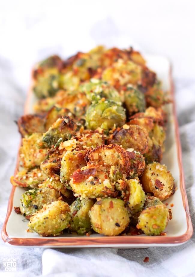 Air fryer Brussels sprouts on a white plate.