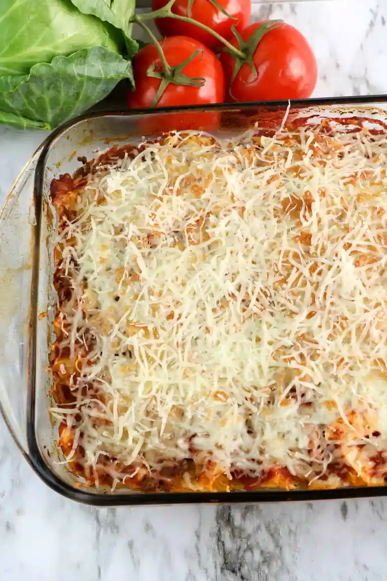 Keto ground beef casserole with cabbage in a glass baking dish.