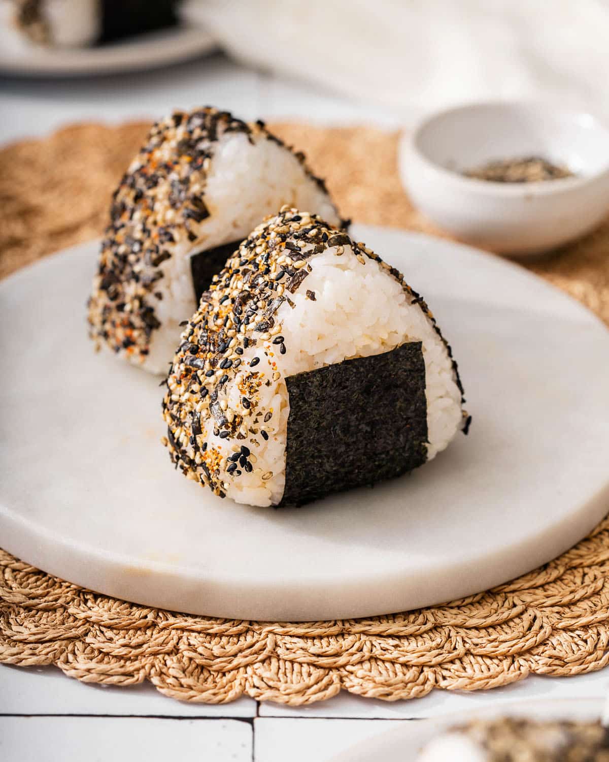 Tuna Onigiri-tuna/japanese mayo mixture stuffed inside rice and covered with toasted sesame seeds, furikake, and crispy seaweed.