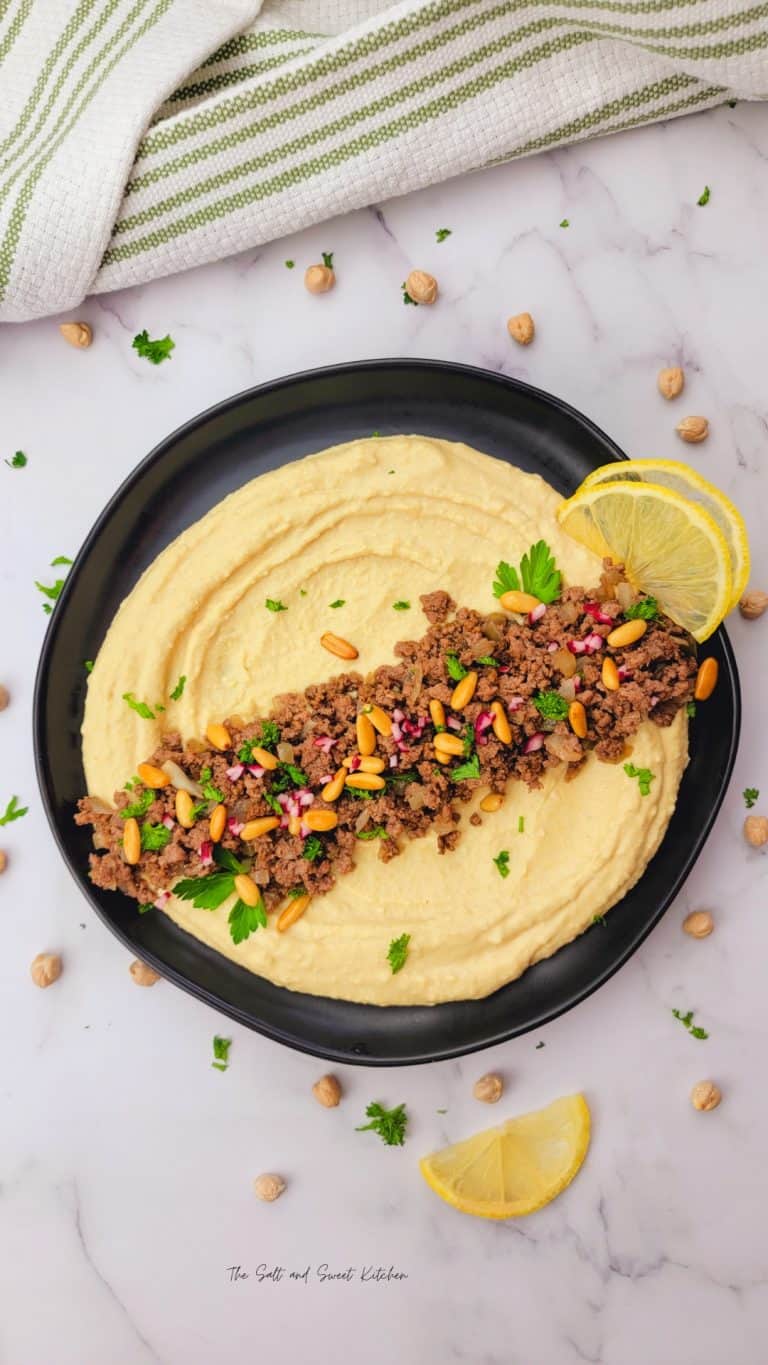 Hummus topped with seasoned ground beef, toasted pine nuts and herbs.