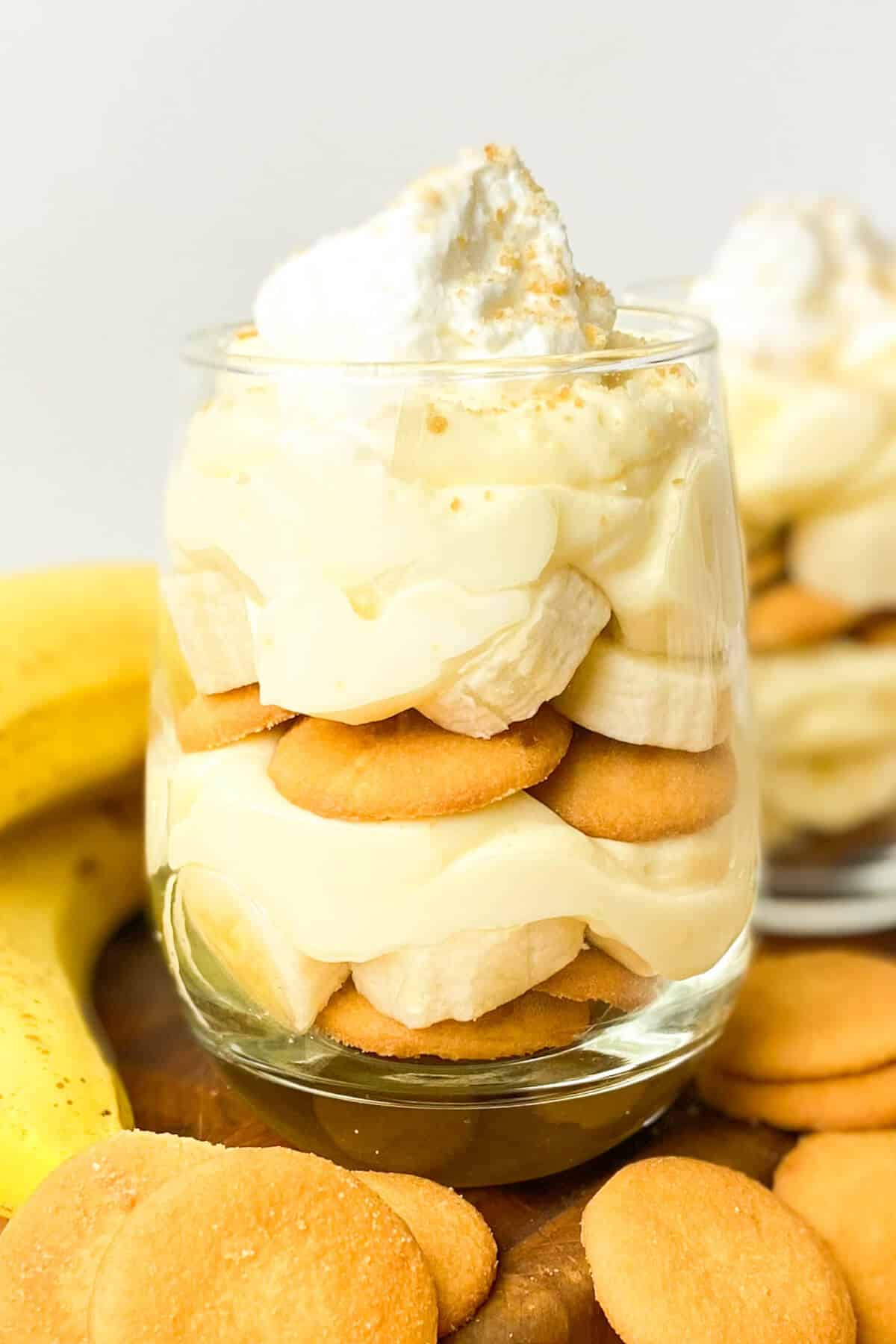 Layered homemade banana pudding served in a glass.