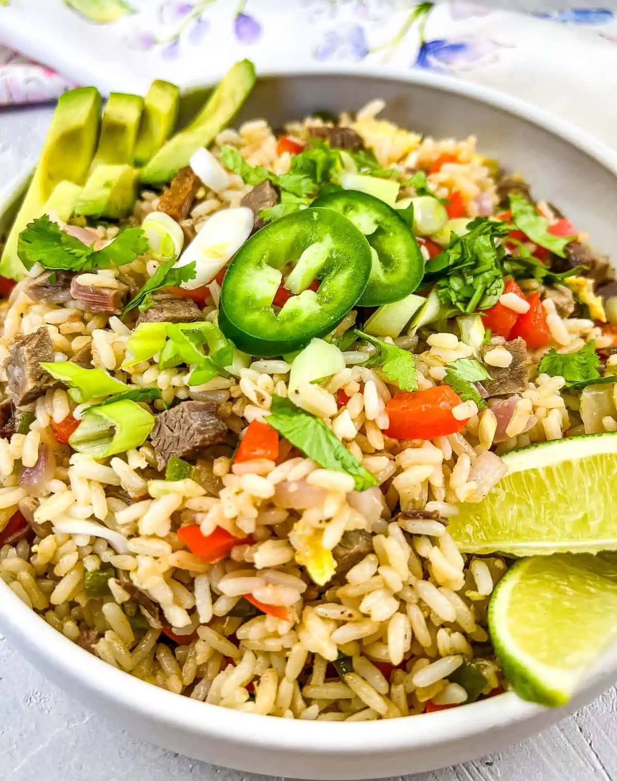 Brisket fried rice with southwestern ingredients like jalapeno, avocado, and lime.