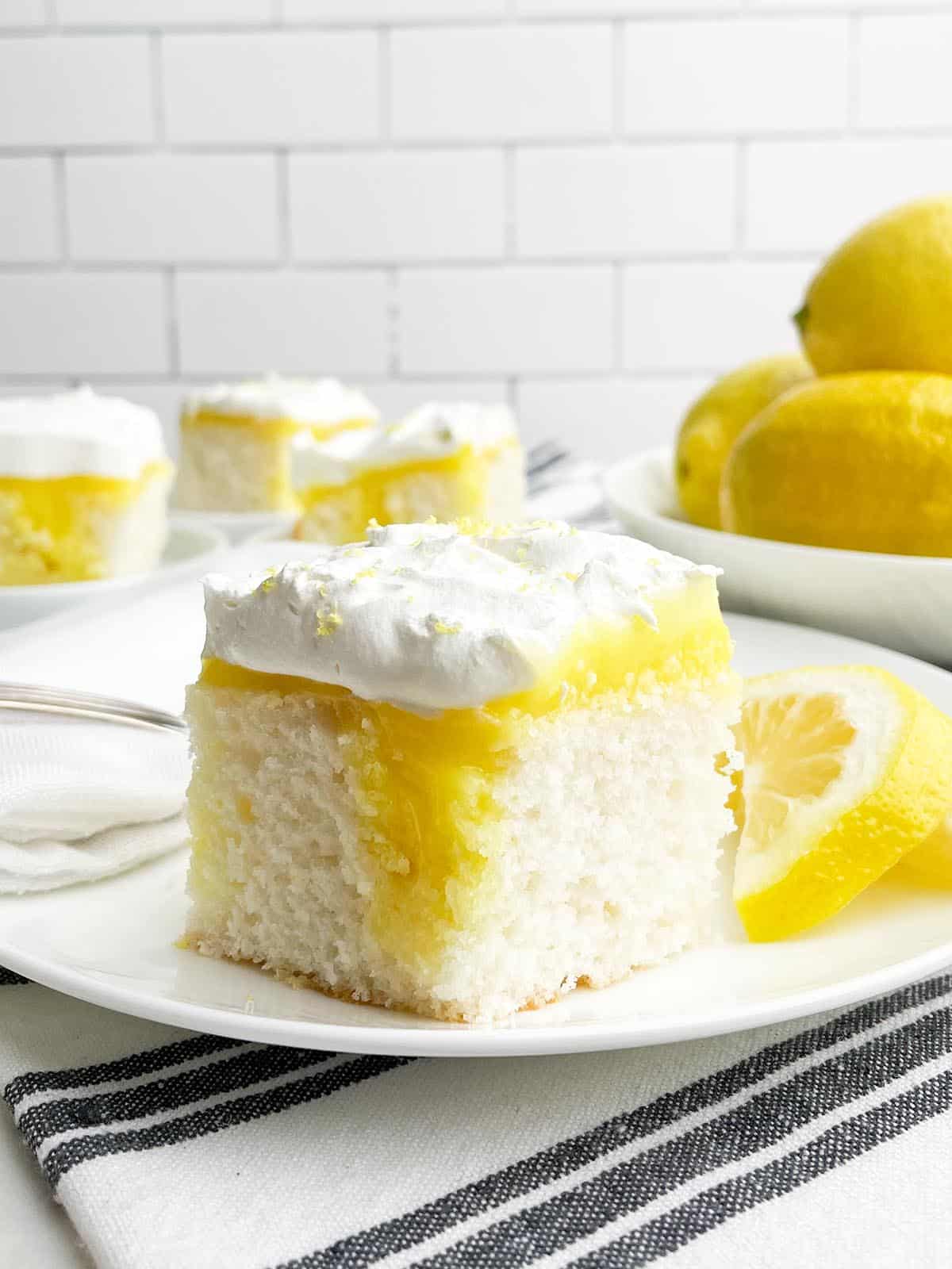 Piece of lemon poke cake.