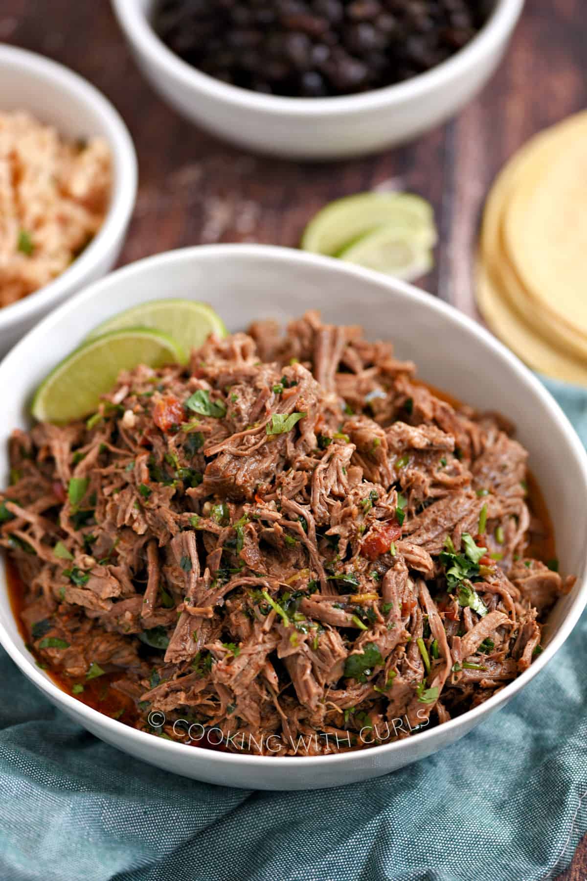 Bowl full of Mexican-style shredded beef.