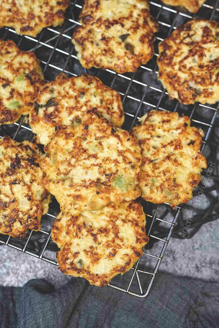 Healthy chicken fritters on a cooling rack.