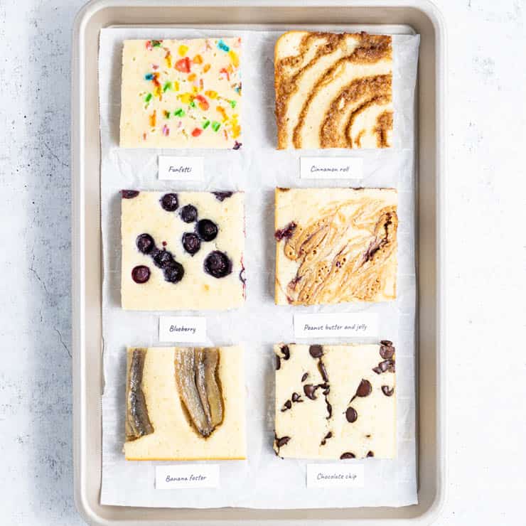 Variety of sheet pan pancakes: funfetti, cinnamon roll, blueberry, pb&j, bananas foster, chocolate chip.