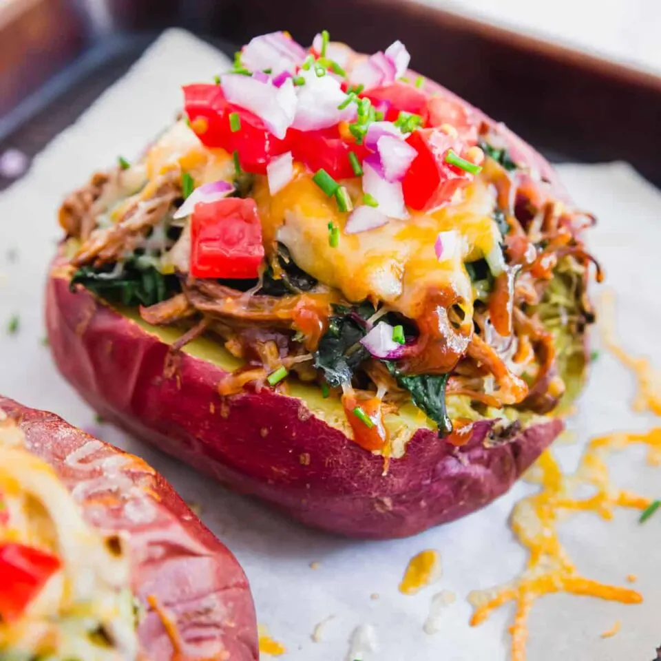 Brisket baked potatoes piled high with toppings.