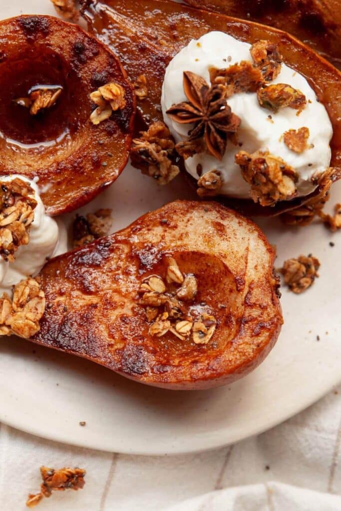 Air fryer pears on a plate.