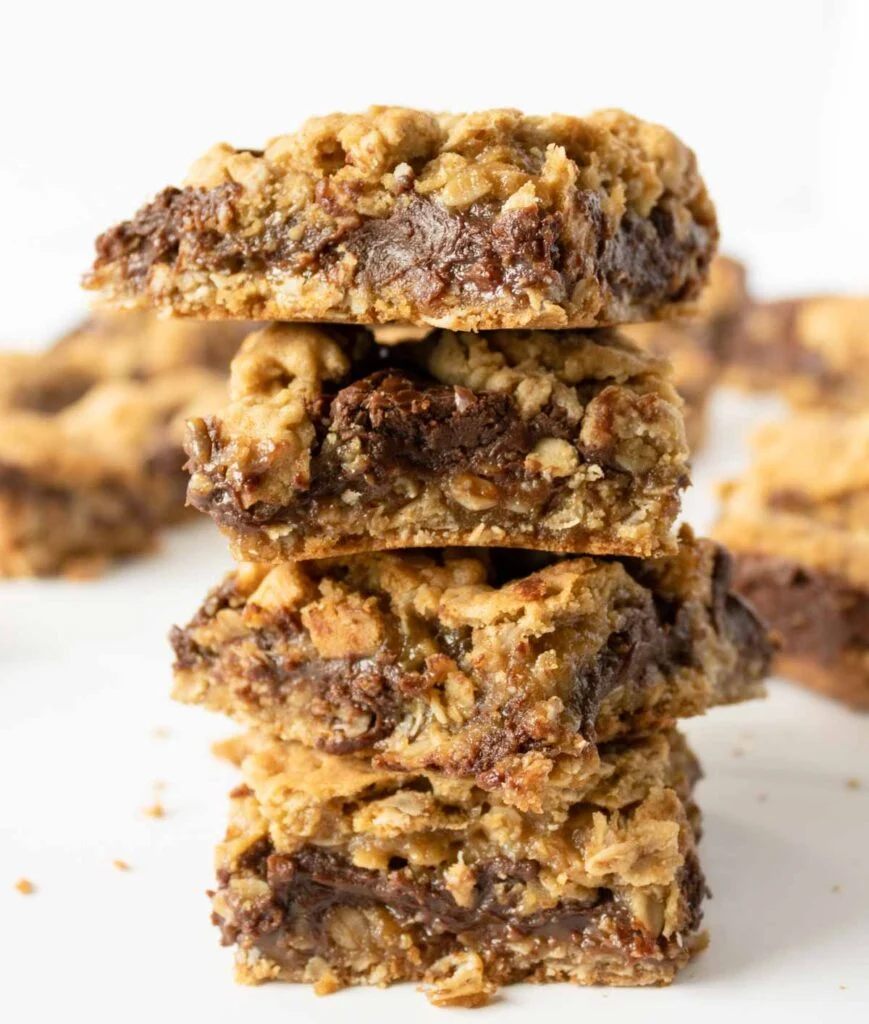 Chocolate revel bars stacked on top of one another.