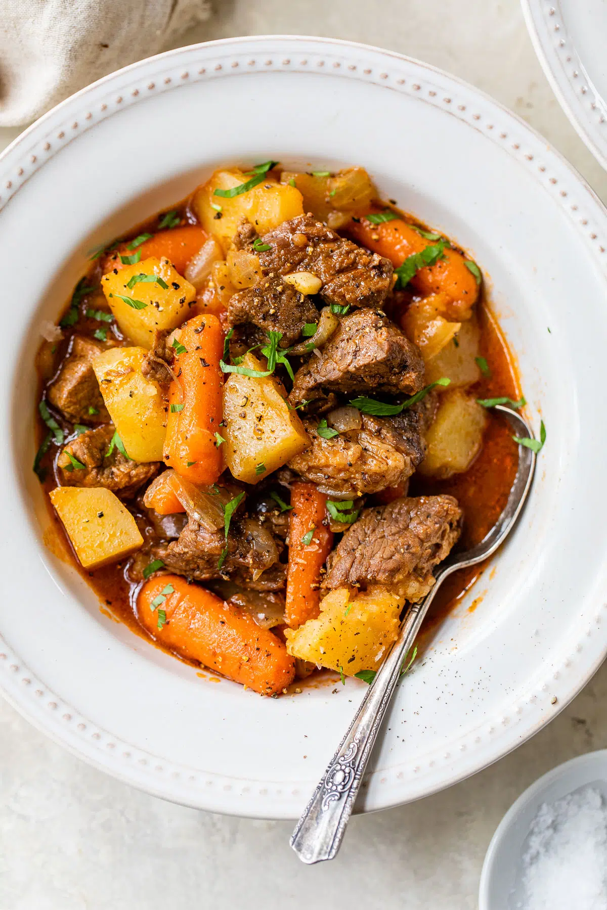 White bowl full of paleo beef stew.