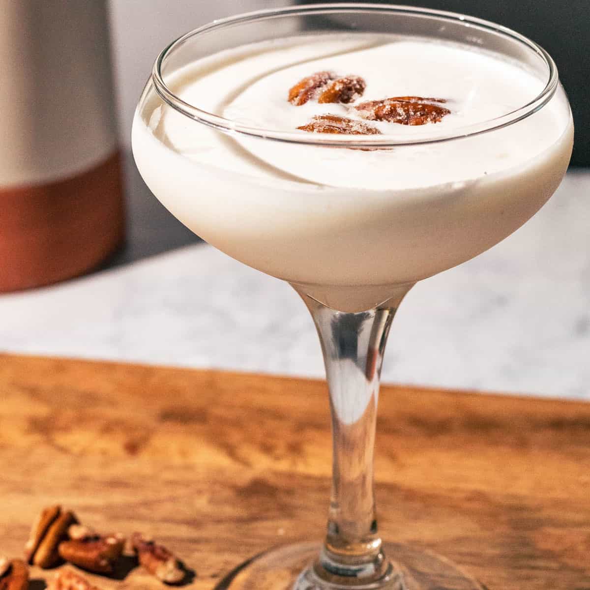 Butter pecan pie martini in a glass.