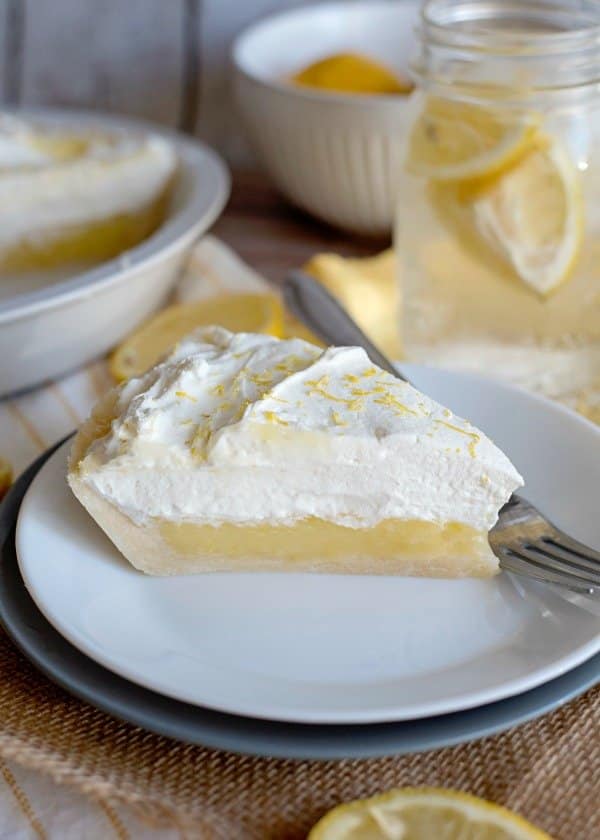 Lemon sugar cookie pie on a saucer with a fork.